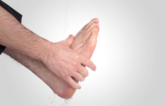 He washes his feet up to the ankles, beginning with the right foot. It is obligatory to wash the feet only once, but it is recommended to wash them three times. If he is wearing a pair of socks, he can wipe over them with wet hands but only under certain conditions. (See page 99)