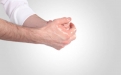 He washes his hands up to the wrists three times. It is recommended to do so three times.